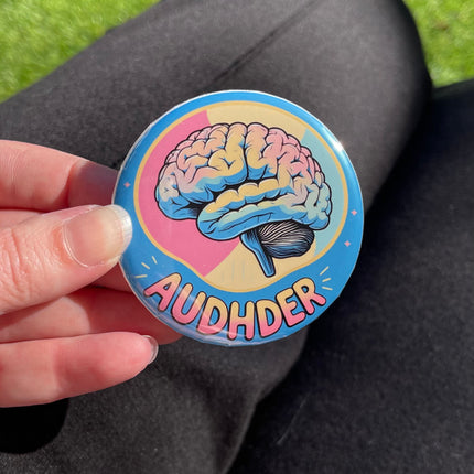 'AUDHDER' Blue Button Badge