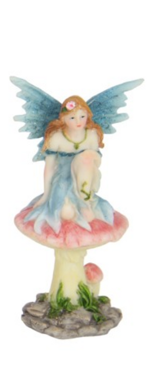 Fairy Sitting on a Mushroom