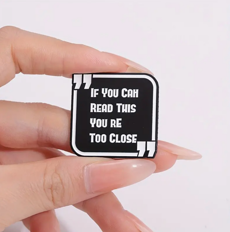 'If you can read this, you're too close' Pin