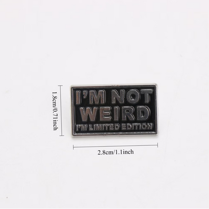 'I'm not weird I'm limited edition' silver and black enamel Pin