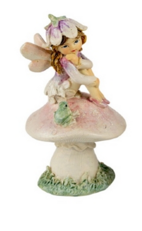 Fairy Friend Sitting on a Mushroom